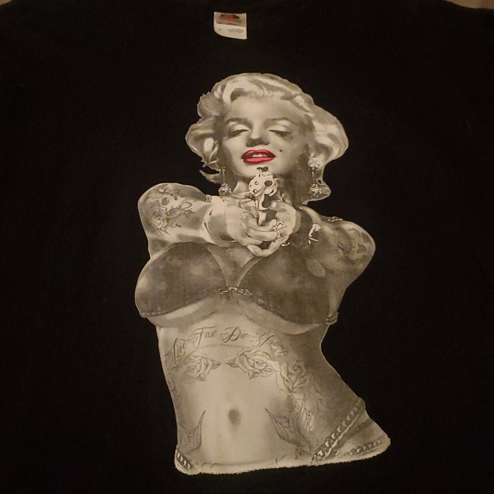 Marilyn Monroe pointing gun and tattooed up tshirt